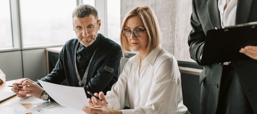 Two tender support consultants assessing a potential response